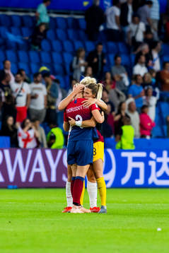 Millie Bright and goalkeeper Carly Telford of England