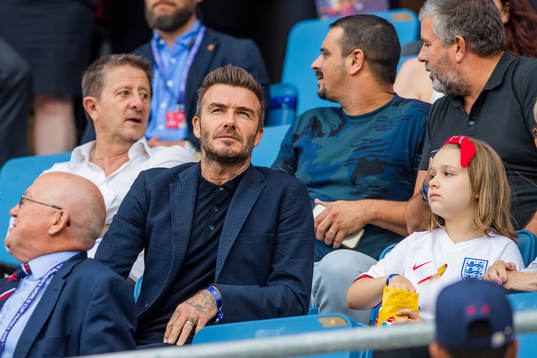 Former football player David Beckham with his daughter