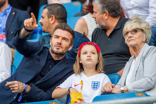 Former football player David Beckham with his daughter