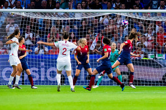 Lucy Bronze of England scores 0-3 behind Kristine Minde,