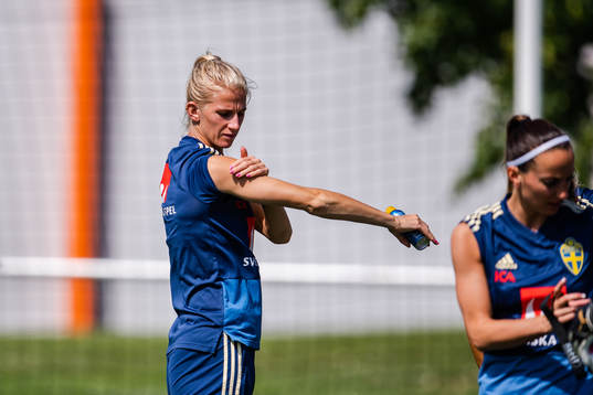 Sofia Jakobsson of Sweden applies sun cream