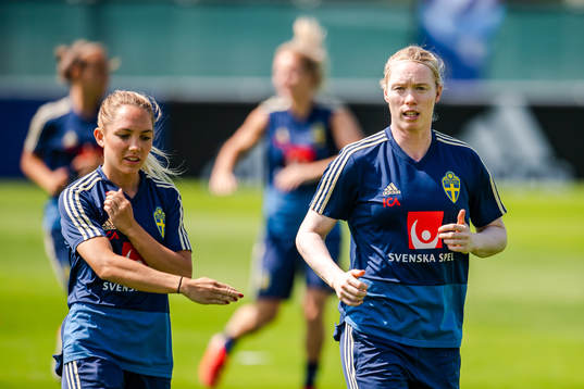 Elin Rubensson and goalkeeper Hedvig Lindahl of Sweden