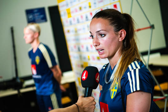 Nilla Fischer and Kosovare Asllani of Sweden
