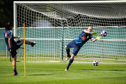 Goalkeepers Zecira Musovic and Hedvig Lindahl of Sweden