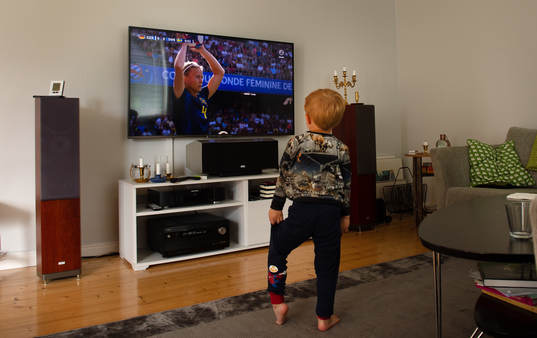 A young boy is watching Magdalena Eriksson