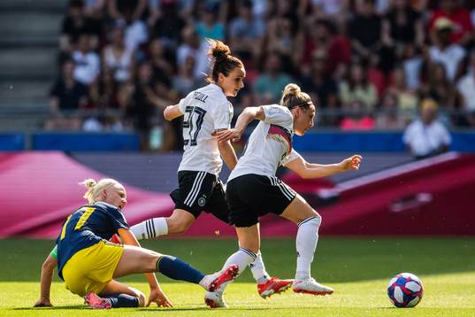 Caroline Seger of Sweden and Lina Magull of Germany