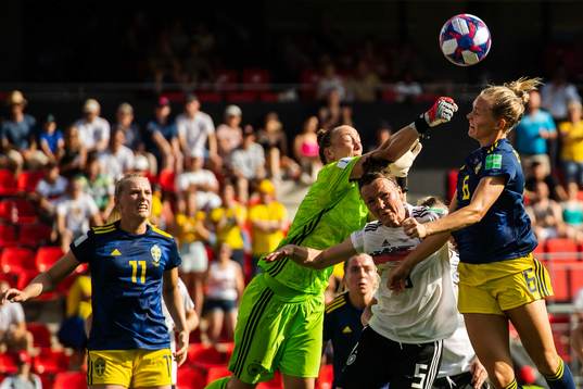 Goalkeeper Almuth Schult and Marina Hegering of Germany