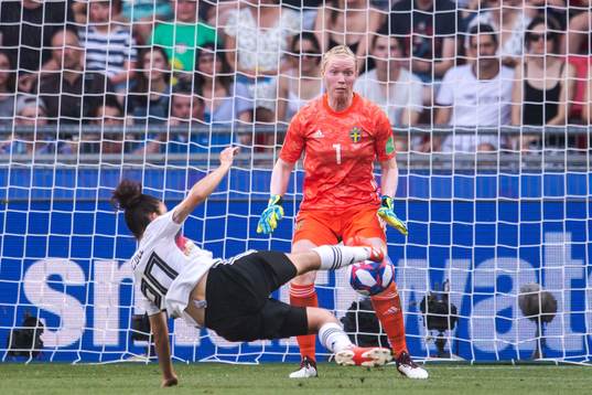 Lina Magull of Germany scores 1-0 behind goalkeeper Hedvig