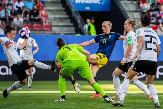 Stina Blackstenius of Sweden scores 1-2 behind goalkeeper