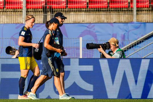 Nilla Fischer of Sweden leaves the pitch