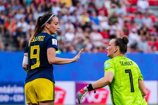 Kosovare Asllani of Sweden and goalkeeper Almuth Schult of