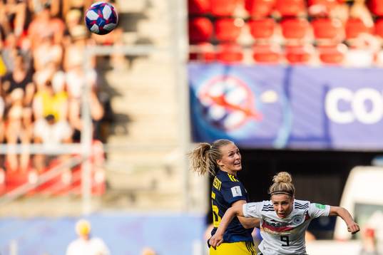 Magdalena Eriksson of Sweden and Svenja Huth of Germany