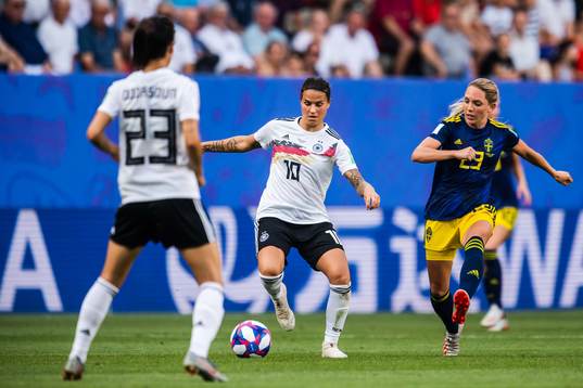 Dzsenifer Marozsan of Germany and Elin Rubensson of Sweden