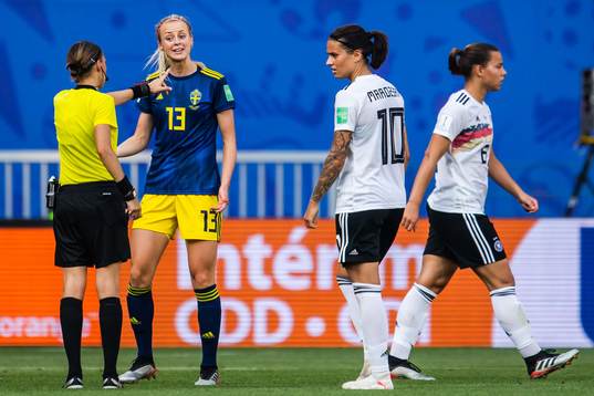 Amanda Ilestedt of Sweden in a conversation with referee