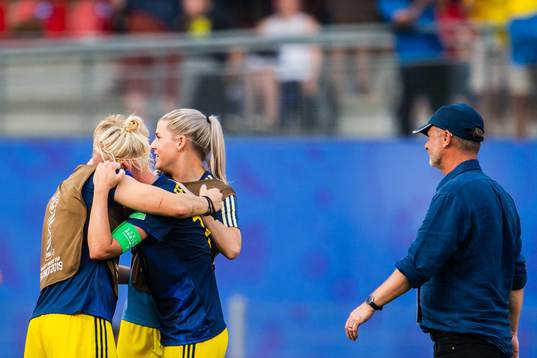 Nilla Fischer and Caroline Seger of Sweden celebrate