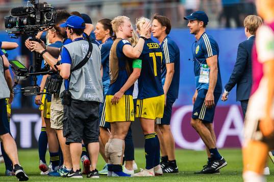 Nilla Fischer and Caroline Seger of Sweden celebrate