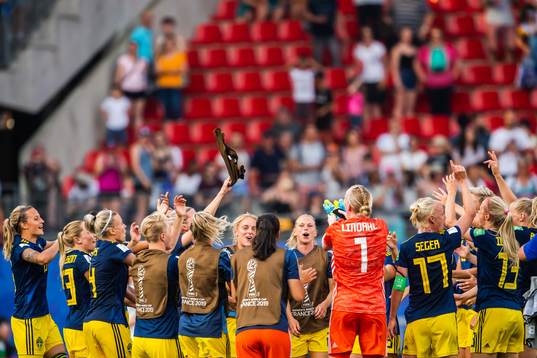Players of Sweden celebrate