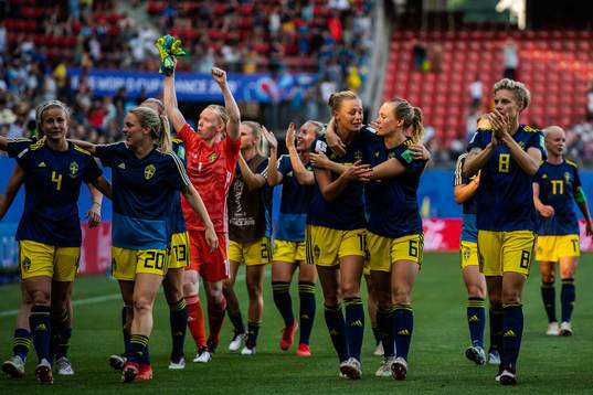 Fridolina Rolfö and Magdalena Eriksson of Sweden celebrate