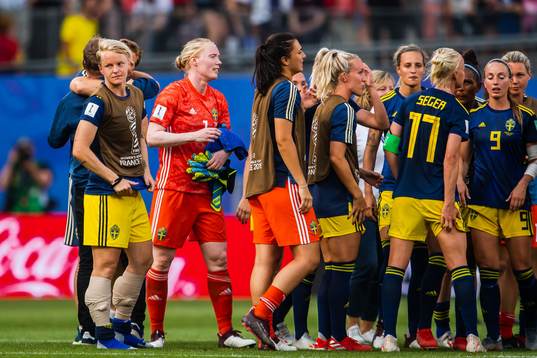 Nilla Fischer and goalkeeper Hedvig Lindahl of Sweden
