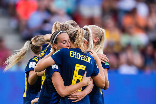 Kosovare Asllani and Magdalena Eriksson of Sweden celebrate