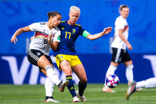 Lena Oberdorf of Germany and Caroline Seger of Sweden