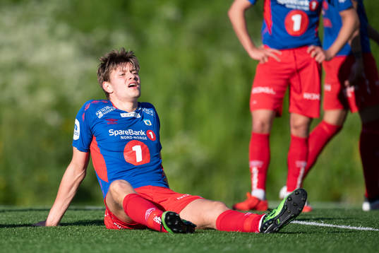 Kristoffer Hay of Tromsdalen with an injury