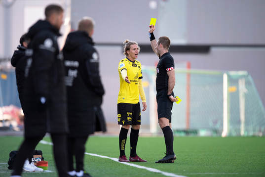 Mikael Birk Giæver Ugland of Start is shown a yellow card