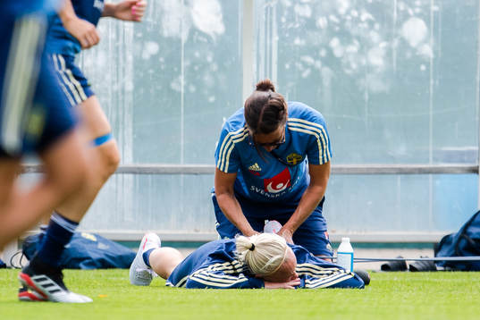 Caroline Seger of Sweden receives treatment