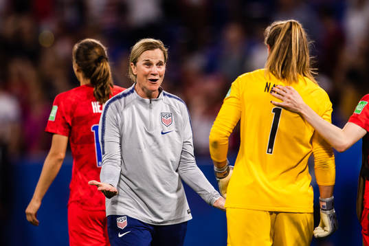 Jillian Ellis, head coach celebrate with goalkeeper Alyssa