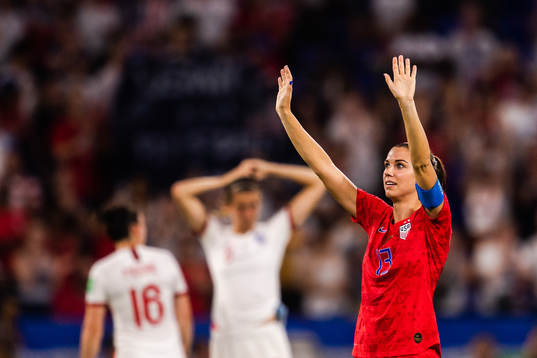 Alex Morgan of USA celebrates