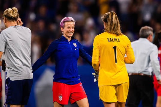 Megan Rapinoe and goalkeeper Alyssa Naeher of USA celebrate