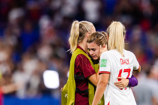 Players of England look dejected