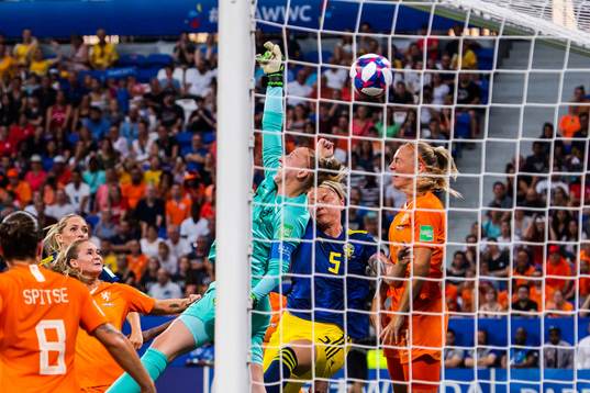Nilla Fischer of Sweden and goalkeeper Sari Van Veenendaal
