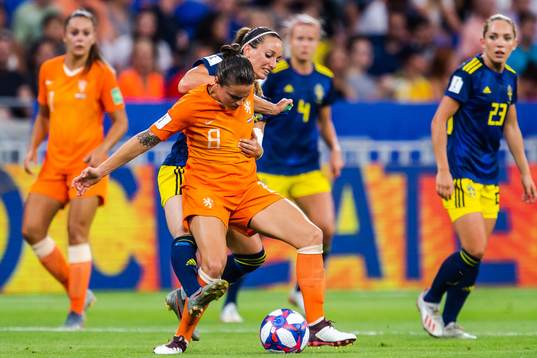 Sherida Spitse of Netherlands and Kosovare Asllani of Sweden