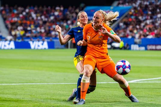 Kosovare Asllani of Sweden and Stefanie Van Der Gragt of