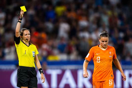 Sherida Spitse of Netherlands is shown a varning by referee