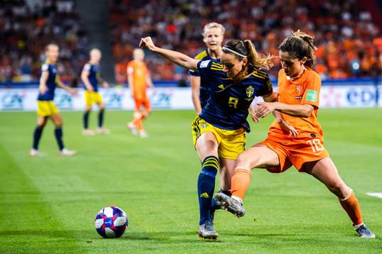 Kosovare Asllani of Sweden and Daniëlle Van De Donk of
