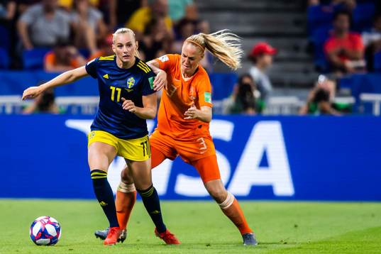 Stina Blackstenius of Sweden and Stefanie Van Der Gragt of