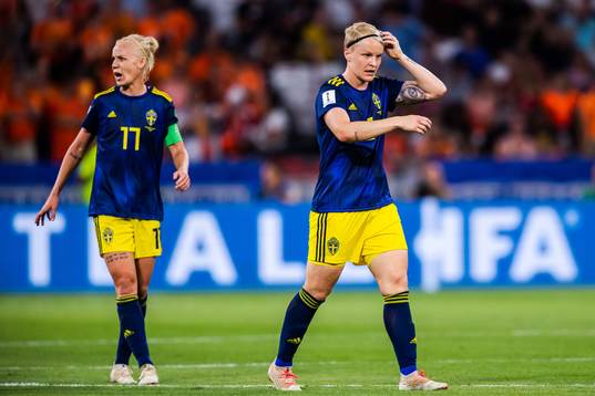 Caroline Seger of Sweden and Nilla Fischer of Sweden looks