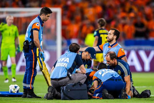 Kosovare Asllani of Sweden receives treatment