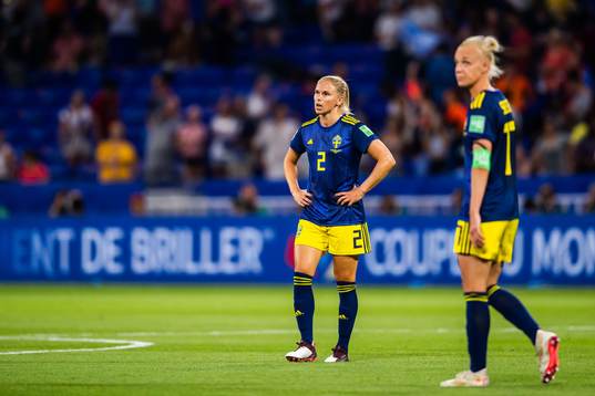 Jonna Andersson and Caroline Seger of Sweden look dejected