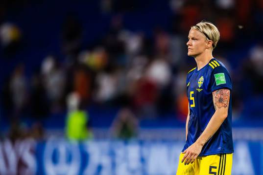 Nilla Fischer of Sweden looks dejected