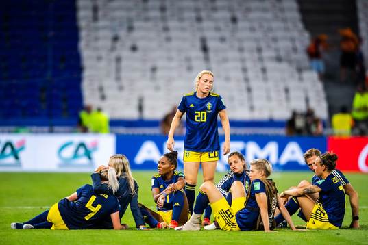 Mimmi Larsson of Sweden look dejected with teammates