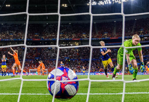 Jackie Noëlle Groenen of Netherlands (not pictured) scores