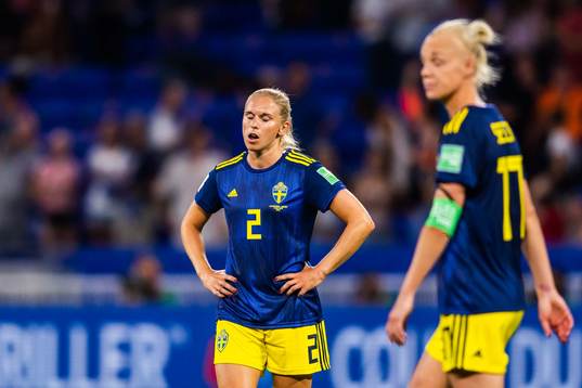 Jonna Andersson and Caroline Seger of Sweden look dejected