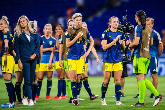 Lina Hurtig and Magdalena Eriksson of Sweden look dejected