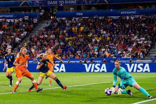 Stina Blackstenius of Sweden and goalkeeper Sari Van