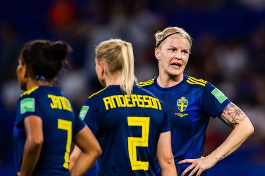Nilla Fischer of Sweden looks dejected