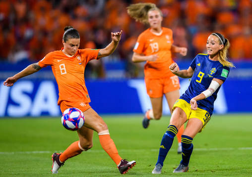 Sherida Spitse of Netherlands and Kosovare Asllani of Sweden