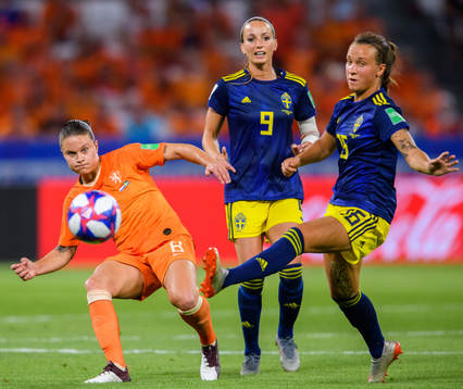 Sherida Spitse of Netherlands and Kosovare Asllani and